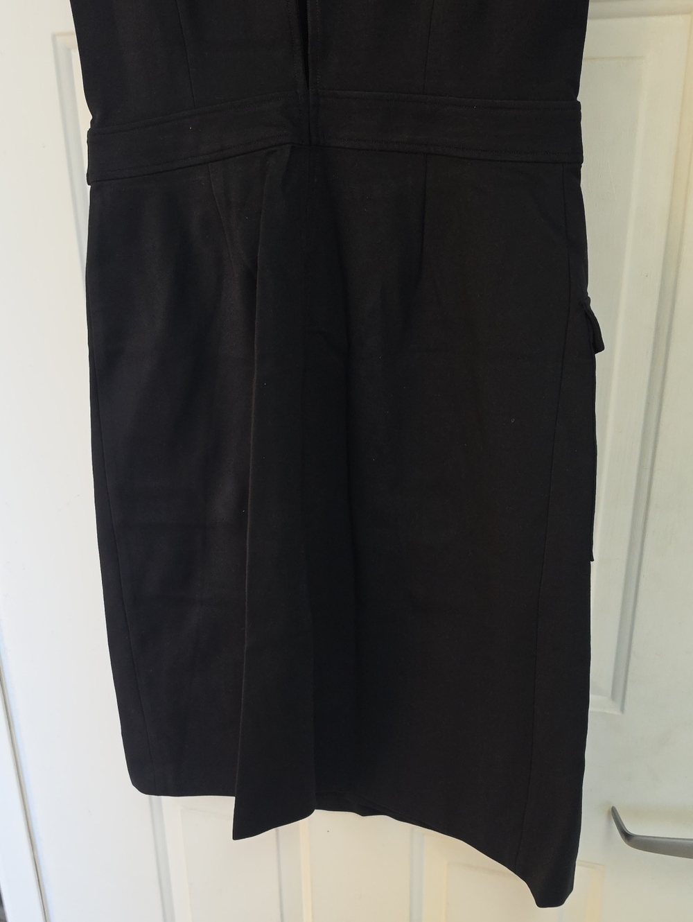 Spanx Sleeveless Ponte Cargo Dress featuring a faux-wrap skirt and a d-ring belt - Picture 8 of 9
